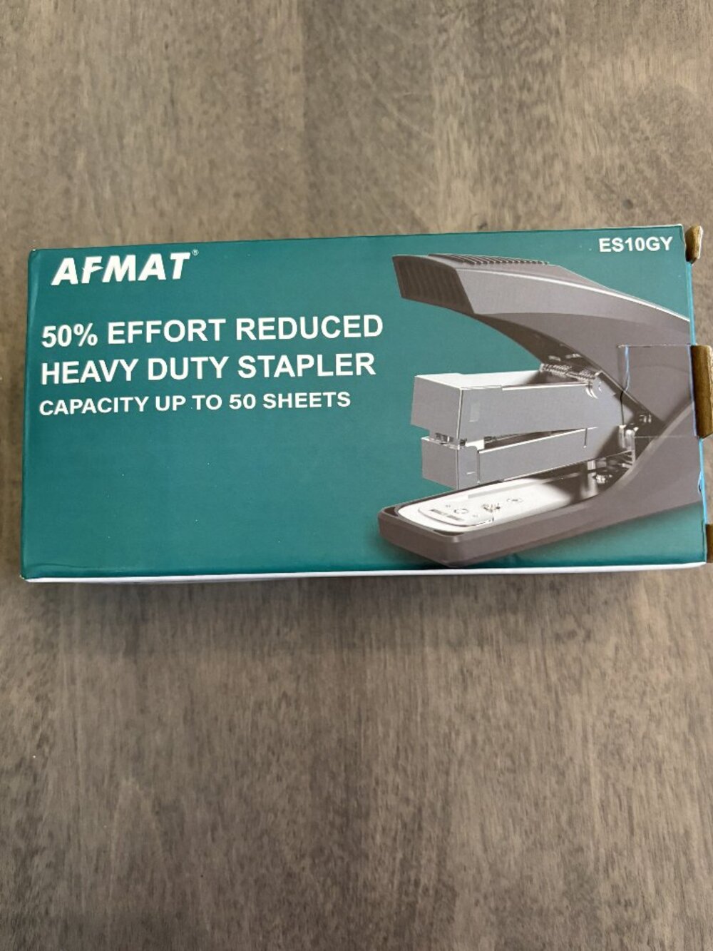Stapler. Easy effort for up to 50 pages. Built in staple remover. NEW